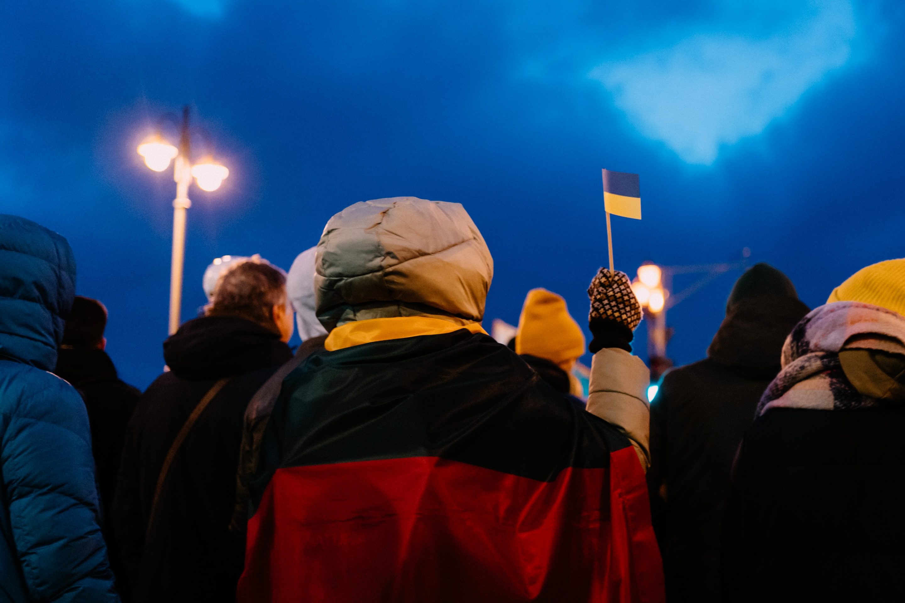 Ukraine protest with ukraine flags at night