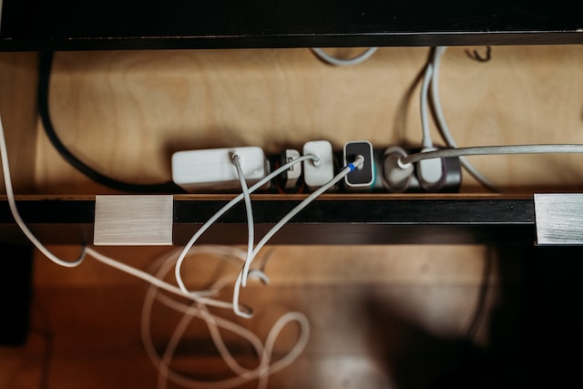 A power strip loaded with plugs