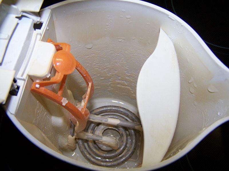 Inside of a kettle with limescale build-up