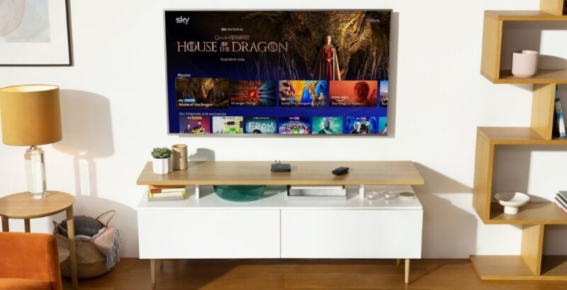 A wall mounted TV showing the Sky Go home page